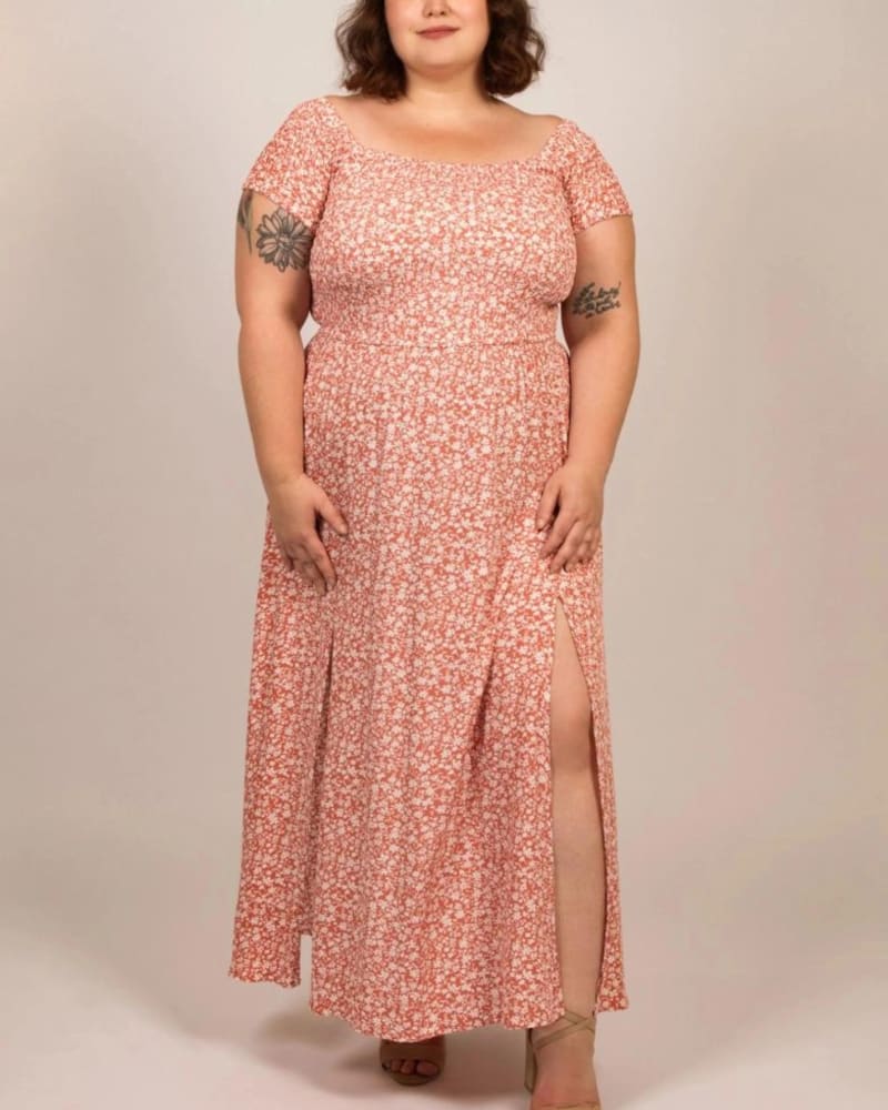 Front of a model wearing a size 1X Daphne Midi Dress On-Off Shoulders Side Slit Floral in Coral by ANNICK. | dia_product_style_image_id:309325